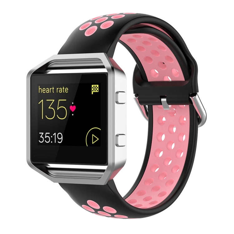 Fitbit silicone watch strap with black base and pink accents, perforated sporty design