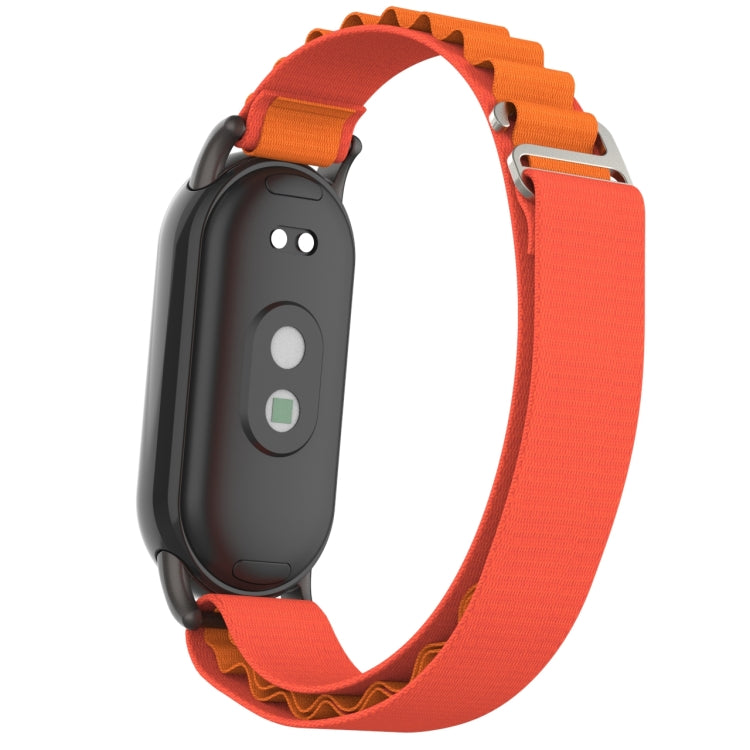 Metal plug loop nylon watch band with orange strap and black watch rear view