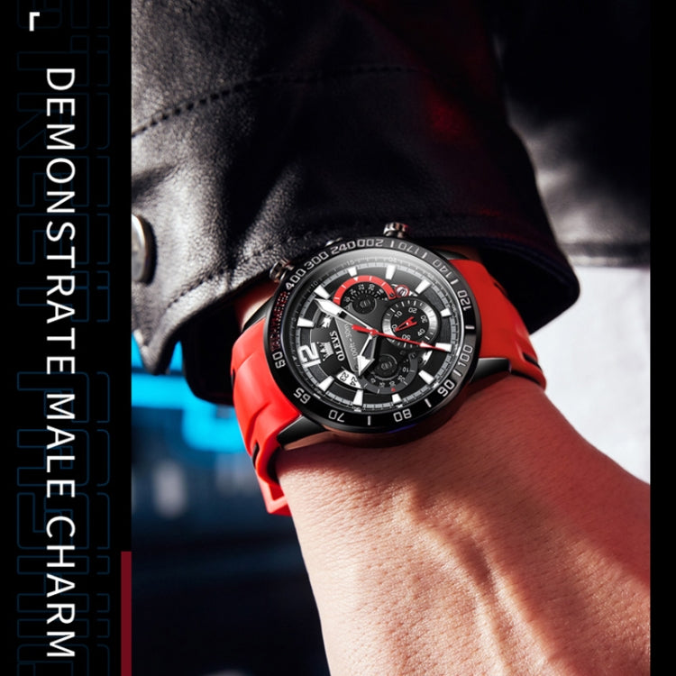 Men's sports quartz watch on wrist, black dial with red details, chunky red silicone strap