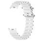 White silicone watch band with perforated links, clasp hardware visible