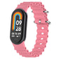 Pink silicone watch band with perforated links and metal clasp for fitness tracker