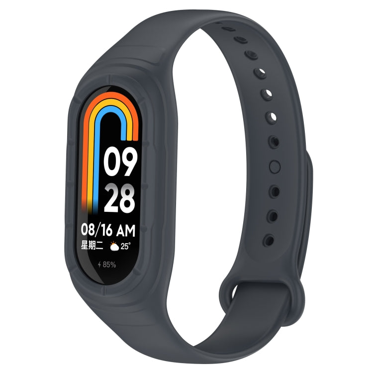 Dark gray silicone replacement watch band with perforated holes and clasp; tracker display