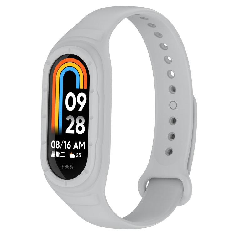 Light gray silicone replacement watch band with perforated holes and clasp; tracker display