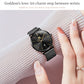 Black dial quartz watch with black mesh steel strap worn on wrist