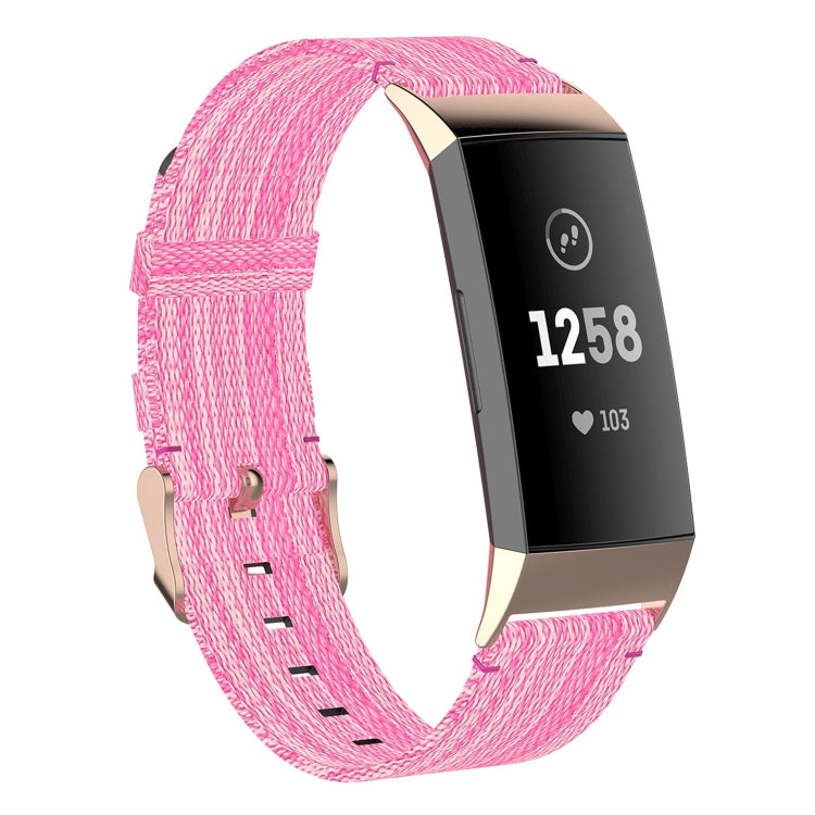 Pink nylon watch strap with stitched perforations and metal clasp for Fitbit Charge 4/3 SE