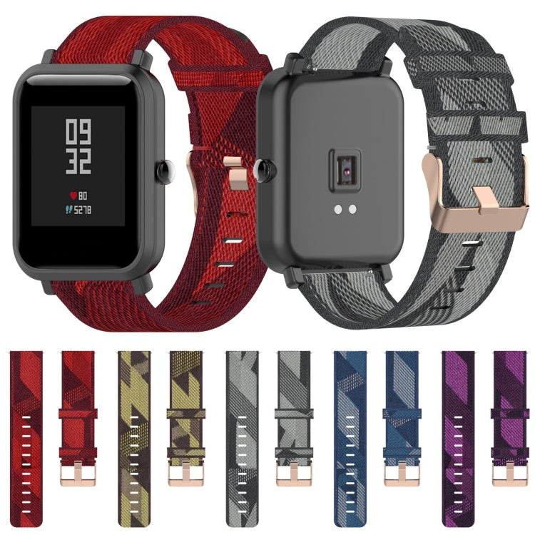 Assorted nylon canvas watch straps with buckles, multiple colors including red and gray