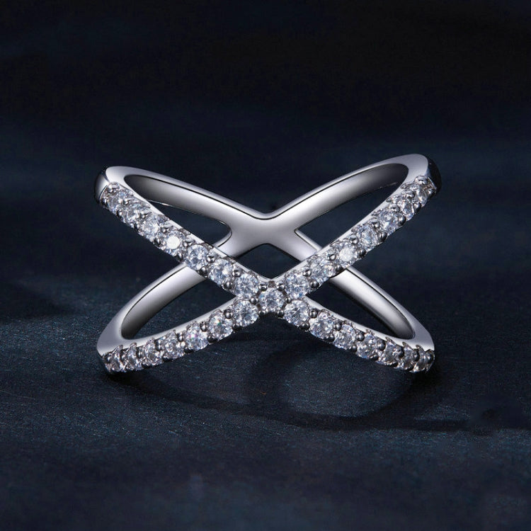 Silver crossover moissanite ring with pavé stones