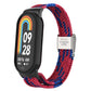 Adjustable nylon braided watch band with stainless steel buckle; red and blue braided strap
