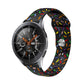 Black silicone watch band with colorful oval dot sprinkles pattern and reverse buckle.
