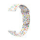 White silicone watch band with colorful oval dot sprinkles, reverse buckle clasp shown.