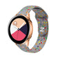White silicone watch band with colorful oval dot sprinkles pattern, reverse buckle closure.