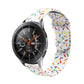 White silicone watch band with colorful oval dot sprinkles and reverse buckle, full loop view.