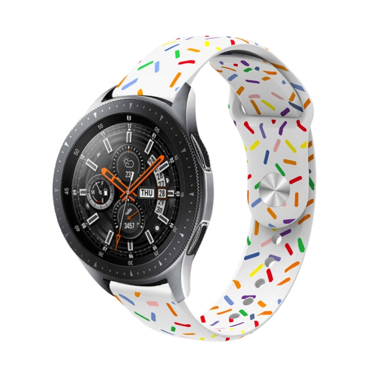 White silicone watch band with colorful oval dot sprinkles and reverse buckle, full loop view.