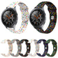White and dark silicone watch bands with colorful oval dot sprinkles and reverse buckles