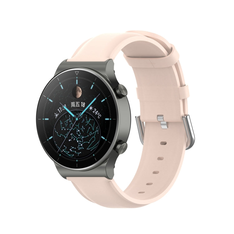 Round tail leather watch band with buckle, light pink strap with adjustment holes.