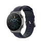 Round leather watch band with black strap and metal buckle for a round smartwatch case
