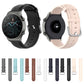 Leather watch bands in multiple colors, showing black and light straps for a round smartwatch
