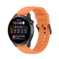 Orange silicone watch band with stainless steel buckle and perforated strap holes