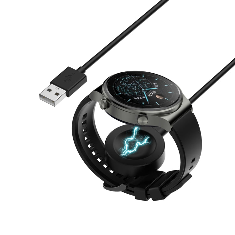Black magnetic charging cable with USB-A plug connected to a smartwatch