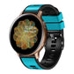 Two-tone silicone watch band with bright teal top strap and black perforated strap