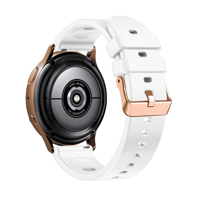 Black silicone watch band with rose gold buckle and vented strap holes