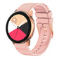 Light pink silicone watch band with rose gold buckle and pin-and-hole strap
