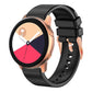 Black silicone watch band with rose gold buckle and textured strap holes