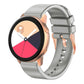 Grey silicone watch band with rose gold buckle and adjustable pin holes