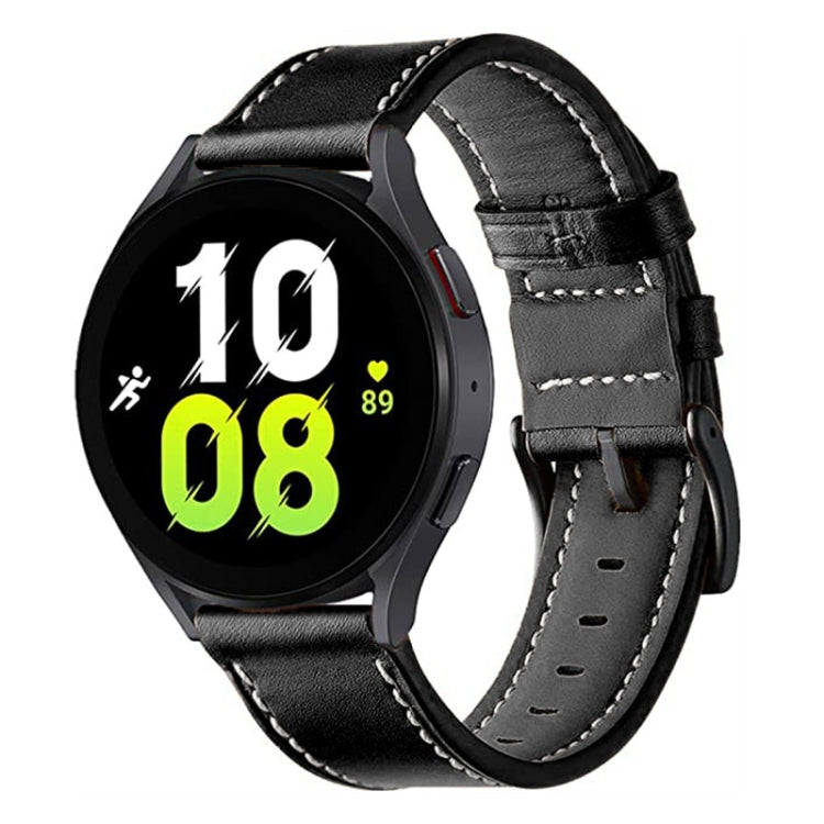 Black leather watch band with buckle, stitched edges, and perforated adjustment holes