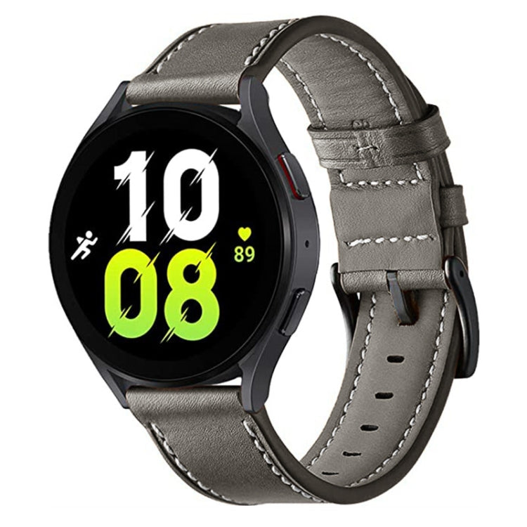 Black leather watch band with buckle and visible watch connection, stitched edge trim
