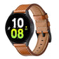 Tan leather watch band with metal buckle, stitched holes, and secure strap loop