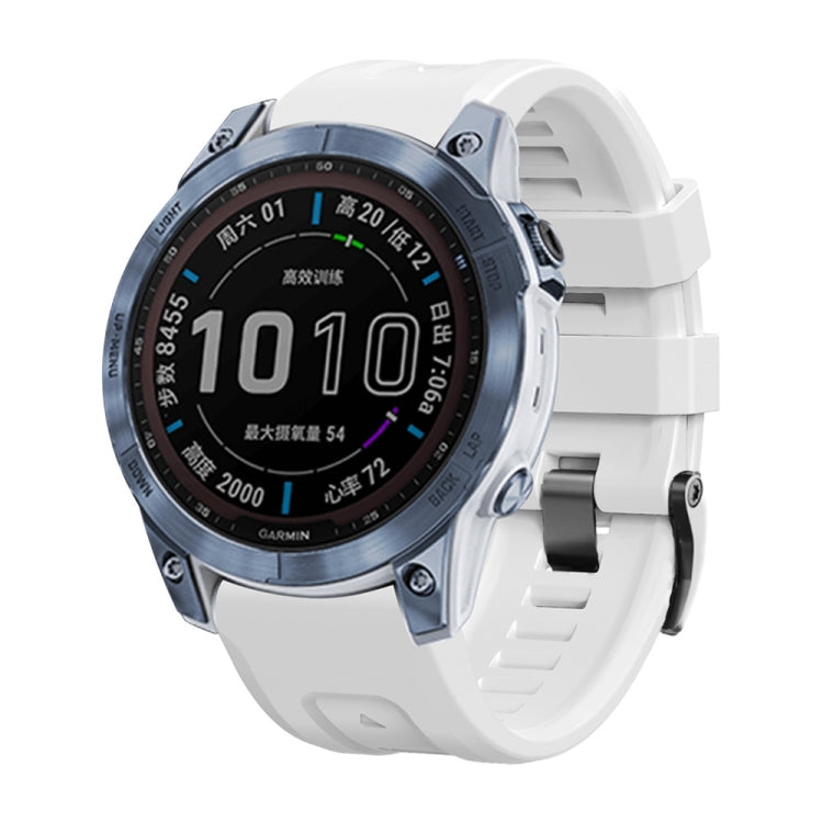 White silicone smartwatch band with metal buckle and latch, shown on watch case