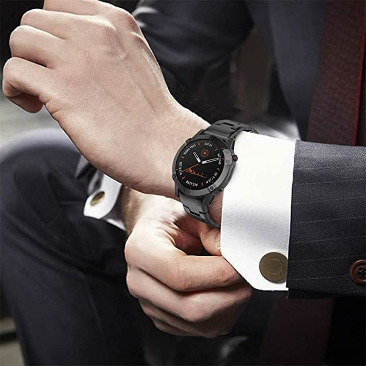 Black titanium alloy quick-release watch band on wrist with round smartwatch