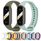 Set of silicone watch bands in multiple colors, each with perforated strap holes
