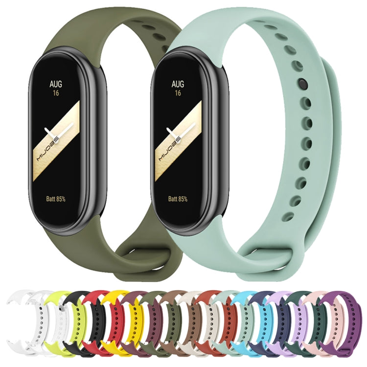Set of silicone watch bands in multiple colors, each with perforated strap holes
