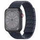 Carbon fiber magnetic loop watch band in dark navy, shown on Apple Watch case