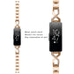 Rose gold metal wrist strap with black smartwatch and rhinestone mosaic link accents