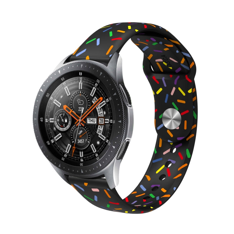 Black silicone watch band with multicolor rainbow dots and metal strap connector