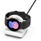 White-and-black silicone charging bracket holding a smartwatch in place