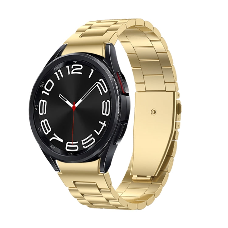 Three Strains metal watch band with gold link design and watch face, gold clasp end.