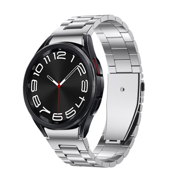 Three Strains metal watch band with silver link design and watch face, silver clasp end.