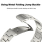 Three Strains metal folding jump buckle, silver watch band clasp close-up.