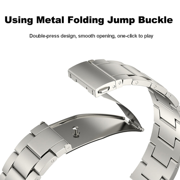 Three Strains metal folding jump buckle, silver watch band clasp close-up.