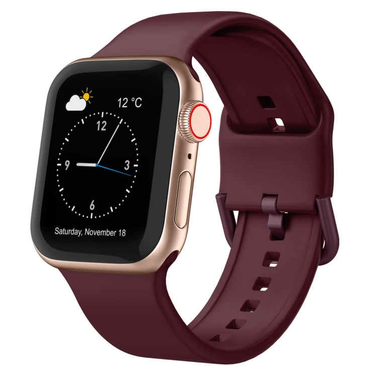Silicone pin buckle watch band with perforations, burgundy red color.