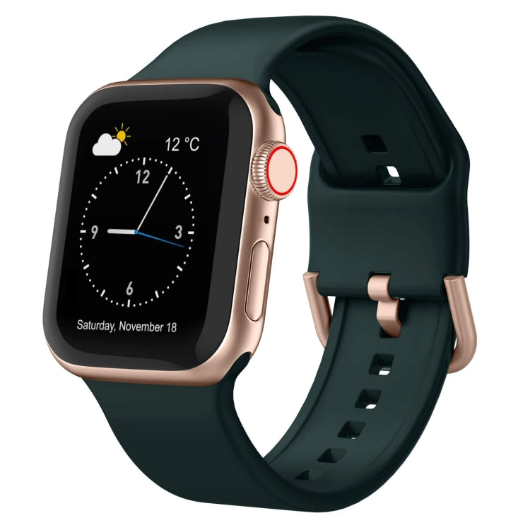 Dark green silicone Apple Watch pin buckle band with perforated strap and clasp.