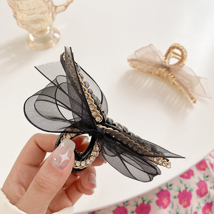 Black bowknot hair gripper with rhinestones, mesh lace, and decorative trim