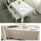 White plaid PVC tablecloth covering a rectangular table with grid pattern