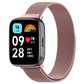 Rose pink metal mesh watch band with clasp, paired with a smartwatch