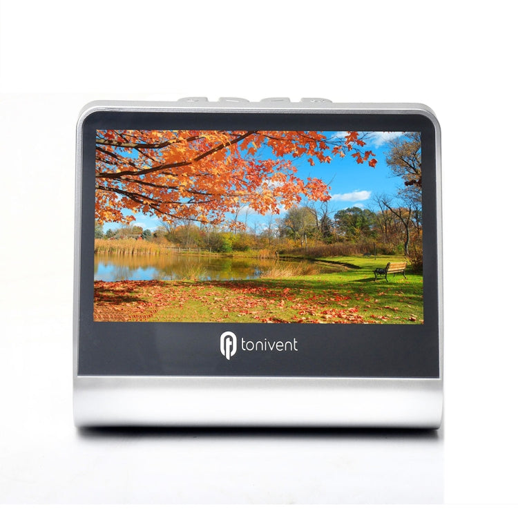 White film scanner close-up with landscape photo on the front screen