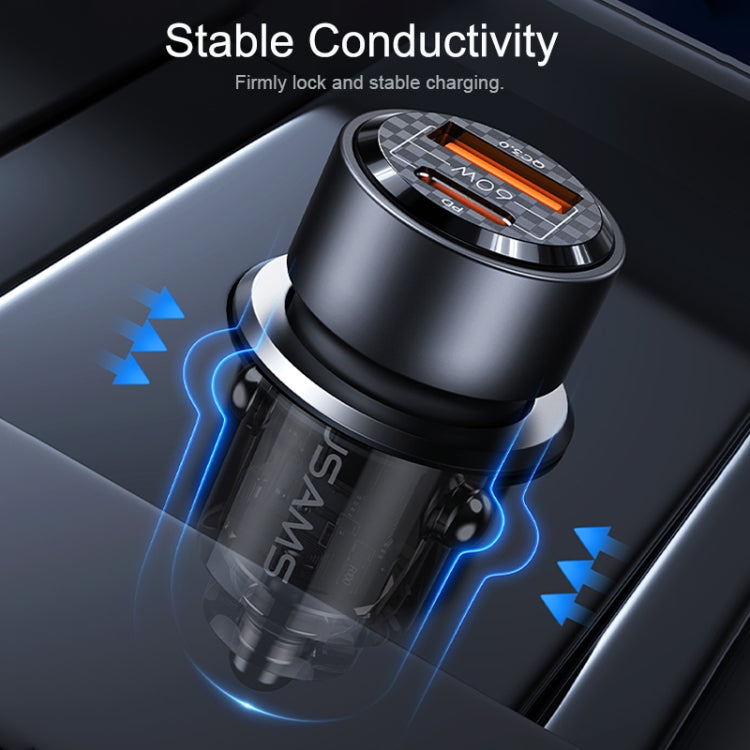 Black dual-port car charger with transparent tube and blue airflow-style light effects.